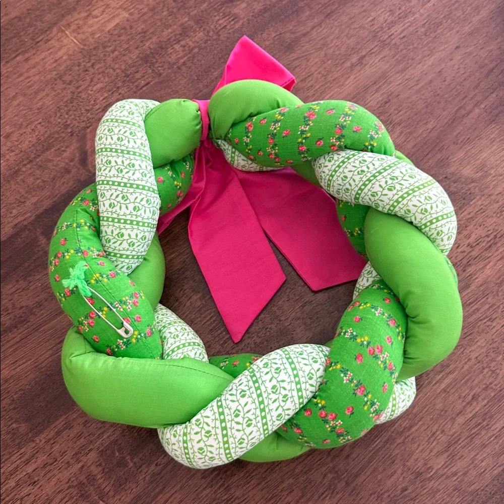 Vintage braided fabric plush wreath with pink ribbon